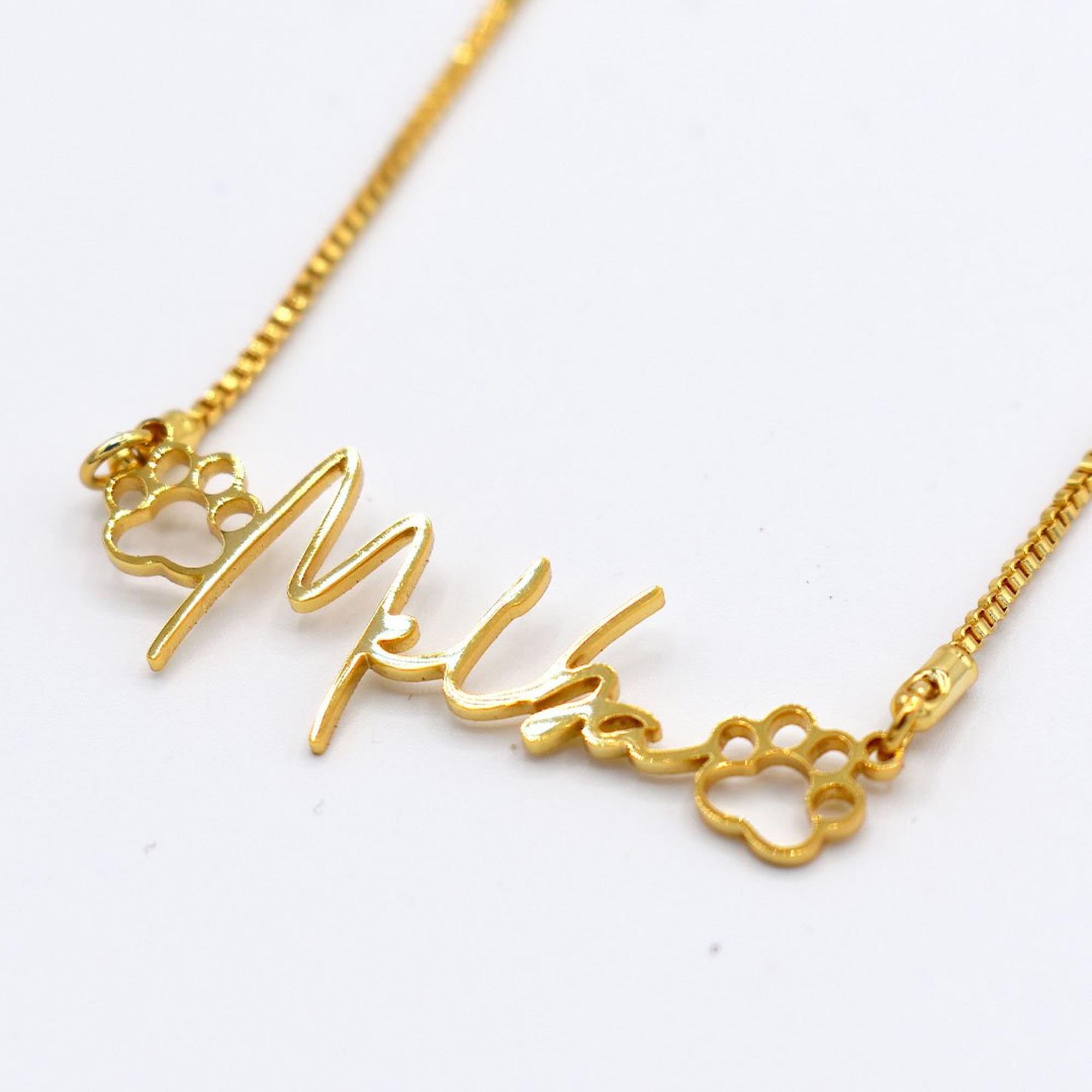 Pendentif écriture