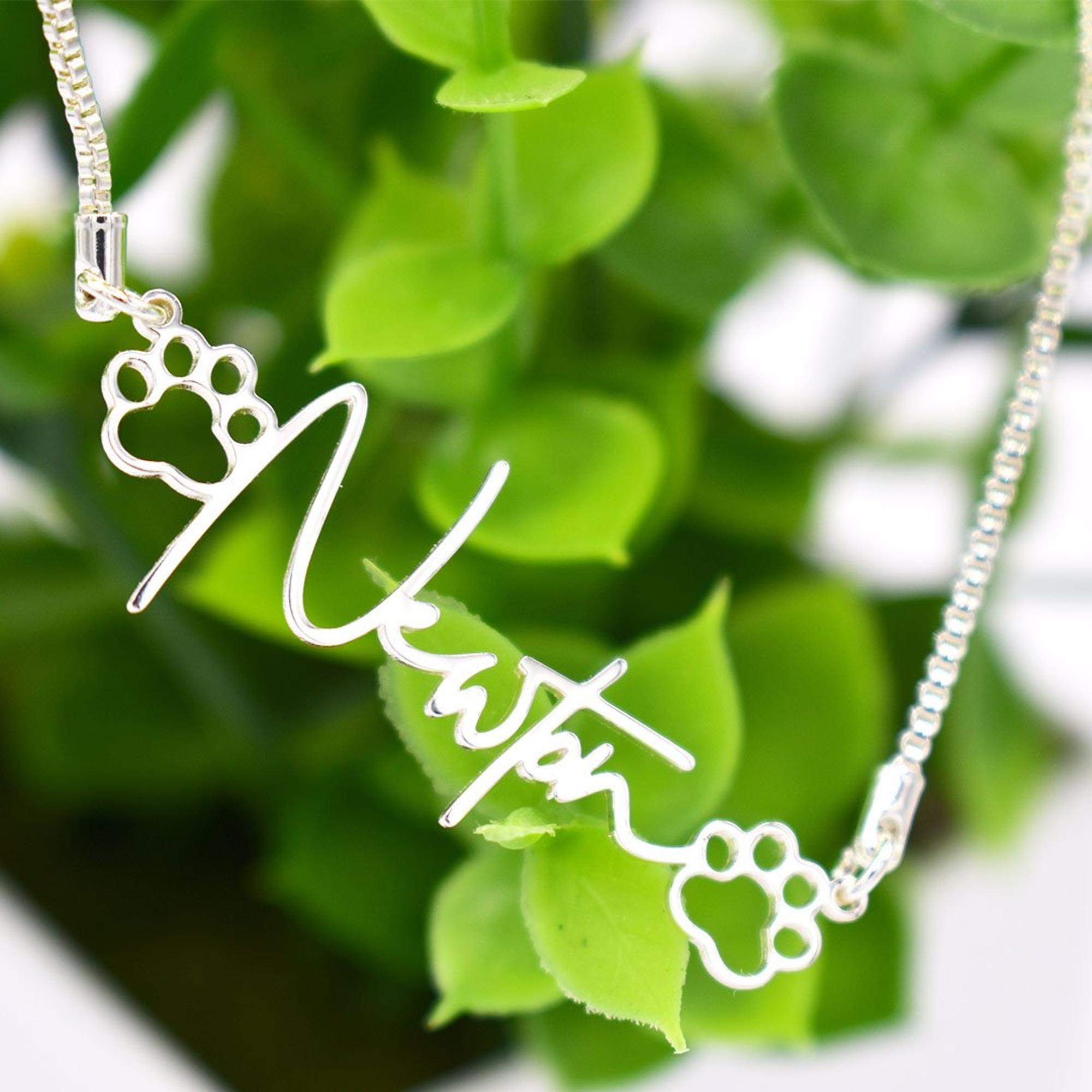 Pendentif écriture